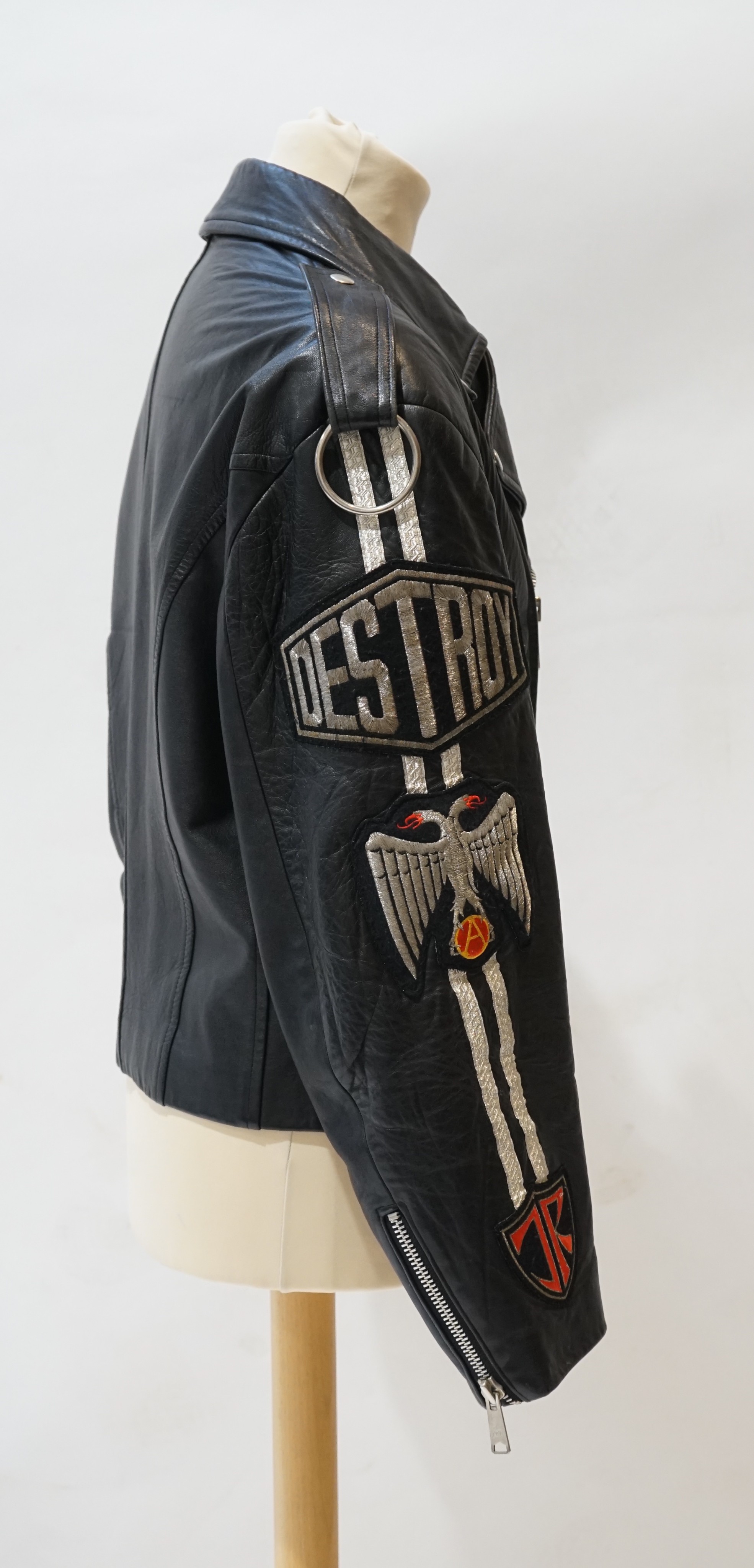 A gentleman's John Richmond black leather biker jacket with 'Destroy' embroidered arms, size L